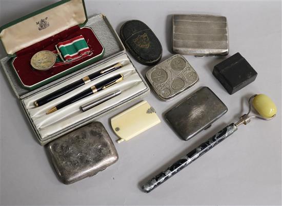 Mixed items including three silver cigarette cases, a Parker pen and pencil and Womens Voluntary Service Medal.
